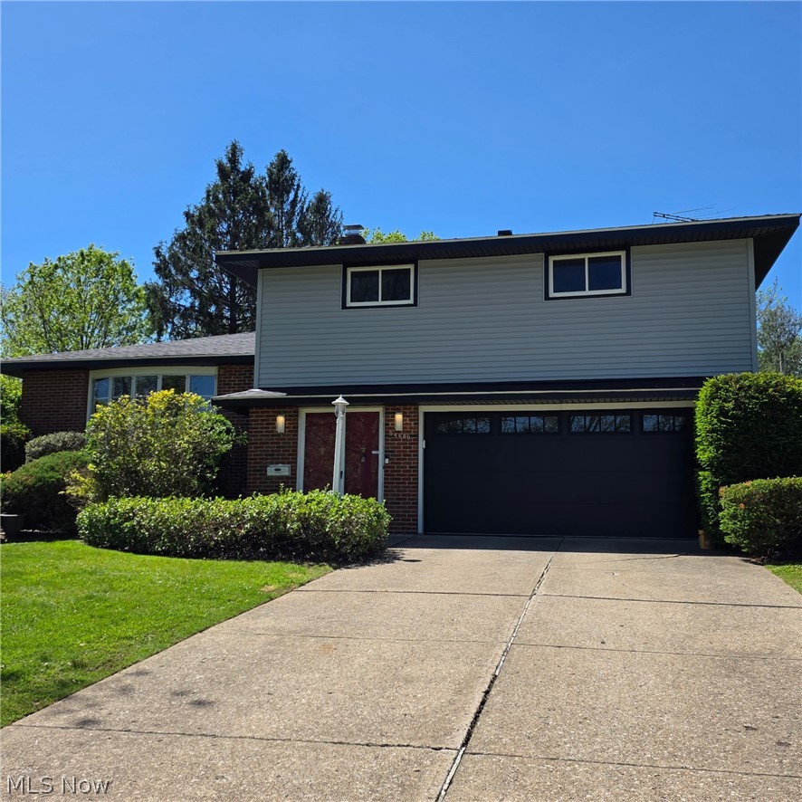 Welcome to 34600 W Sharondale, Solon - Only 2 owners for this beautiful home that has been through many renovations over the last 3 years.  All new windows, siding, roof, gutters, downspouts, and soffits and garage doors.  Kitchen has soft closet cabinets and drawers with quartz counters, the pantry has pull-out shelves for each reach, double trash/recycle drawer and a baking pan cabinet, perfectly designed with corner cabinets and farm sink.  Luxury vinyl flooring throughout Kitchen, family room, bathrooms.  There is a shower in the basement with oversized utility sink, freshly painted with vented glass block windows with new vinyl flooring on laundry side and workshop.  New ceiling tiles and carpet with a desk area in part of the basement.  New HVAC - Furnace and Air Conditioner.  Enjoy 3 season room with plenty of windows to enjoy the spacious backyard.  Additional pictures coming soon