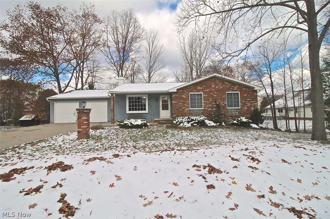 Beautifully maintained four bedroom Ranch with finished walk out basement and Additional Living Suite!  Very spacious, open floor concept allows you to entertain and still be able to communicate with all your guests from the lovely updated kitchen with newer appliances.  Beautiful carpet just installed 11/2016; as well as the new exterior doors, chimney swept and the back deck stained. Other updates include: new doors, toilet, new bath flooring, new garage door and openers, new fixtures all completed in 2015. Refrigerator replaced 2007 and windows in 2005.  Huge beautiful yard, with newer landscaping completed in 2014 along with exterior lights and lamps, poured concrete front patio, and newer gutters and downspouts. The washer and dryer are staying with the home as an added bonus! Gorgeous mature trees, near Silver Springs Park.  Certainly not your typical Ranch!