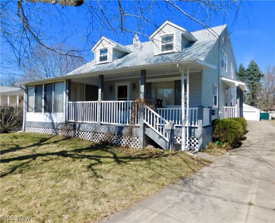 Welcome home to this lovingly maintained Cape in Mogadore!  This home boasts 4 spacious bedrooms and 3 full baths un a unique layout that could be perfect for an in law sweet, teen suite or possibly a rental! The first floor offers a very large living room, kitchen, dining room 2 bedrooms and a full bath.  Off the dining room is a sunny 3 season room that leads out to the front porch. The second floor includes 2 more bedrooms, a second living room/family room a second kitchen and full bath.  The basement has a finished rec room, workshop laundry and another 3/4 bath! Really nice storage space throughout. Enjoy the large lot and an oversized 2 car garage with newer nature stone flooring, plus a carport!  This home has so much potential and tons of space, bring your personal touch and make it yours! Home Warranty included!