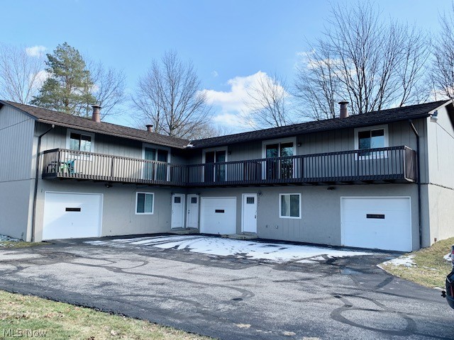 Dont miss this stunning remodeled 2 bedroom townhome style apartment in Stow! Through the front door you will find a spacious family room and half bath, as well as a large in suite laundry and storage area that leads to your attached one car garage.  Upstairs you'll find the main floor, all completely remodeled! Exceptional kitchen with stainless appliances and LVT floors.  The sunny living room leads out to a lovely deck.  Down the hall are 2 nicely sized bedrooms with great closet space and a beautifully remodeled full bath.  Convenient to everything, this place has it all!  All adult occupants must fill in an online application that runs credit, criminal and eviction history as well as income verification. $50 application fee.  No Section 8, No smoking, No dogs.