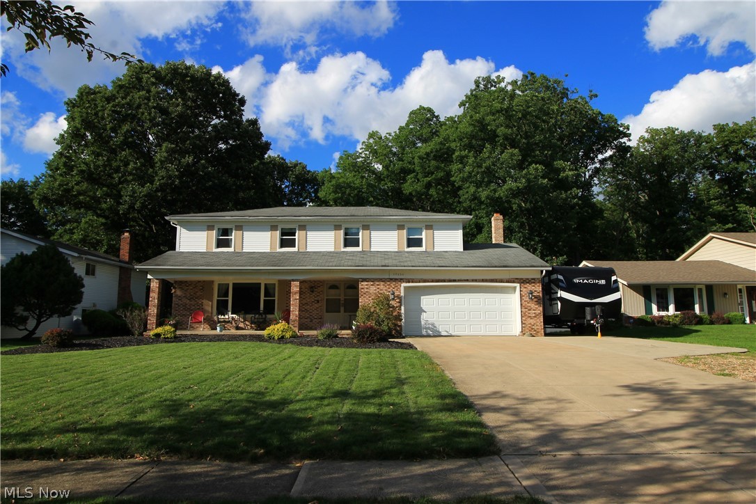 Welcome home to 17030 Hunting Meadows. Spacious colonial features 4 bedrooms, 3 Baths w/fenced in back yard. The Owner’s Suite highlights a walk-in closet, private bath and sliding glass doors to your own private balcony! Located in a desirable community in Strongsville, the home offers large windows for natural light and bright rooms including Living Room, Formal Dining Room, Foyer, and step-down Family room, all with fresh paint and updated real engineered hardwood flooring. Be your own chef in our open and spacious eat-in kitchen with abundant counter space and ample cabinet storage too. The kitchen also features sliding doors opening to the patio and back yard. All appliances stay with the home. The dreamy front porch is great to relax on when starting your day or finishing a busy week. Two car garage, an extended driveway for RV parking pad, makes this a wonderful place to call home! Call for an appointment today!