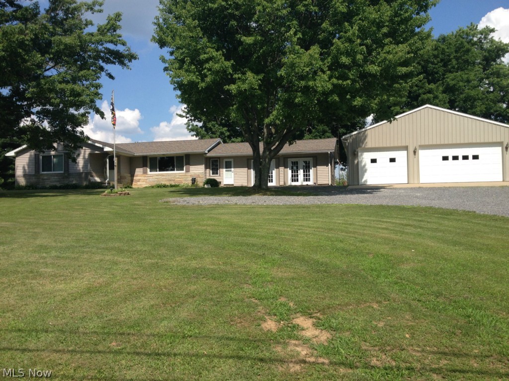 Beautiful Large Ranch home on 1.13 A m/l. 4 BR & 3 Baths. 24 X 24 1st Floor Family Rm with Custom Made Bar & French doors. Many Updates since 2003: Roof, Thermo Pane Windows (Easily cleaned from Inside), Covering on 20' x 12' Patio, French Doors, Floor Coverings, Family Room, Customized Master Bedroom Suite with Whirlpool Tub & Separate Bath with large Shower, Carpets, New Counter Tops on updated Cabinets in Kitchen, Appliances, 2 Electric Heat Pumps w/CA, Must See to Appreciate!! 32' x 40' Steel Pole Bldg Garage with 32' x 10' Tool Canopy built in 2004 - 3 Overhead Garage Doors with Openers, 1 Oversized Door for Oversized Vehicles - Concrete Floor with large Concrete Apron - Heated with Woodburner - Large enough for 4 cars. Newer 16' x 12' Custom Storage Bldg with wood floor & Storage Shelves.  Total Living Area includes Lower Level. Assessment is MWCD $12.00 yr. Oil & Gas Rights retained by Seller. Realtor is related to Seller.