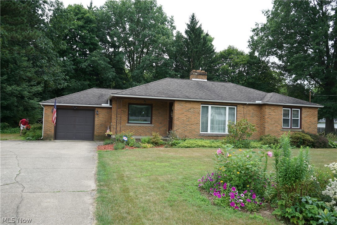 This well maintained brick ranch has been a wonderful home to a long time family. The time has come for downsizing and a new family to continue the tradition of making amazing memories. There is space to grow and a beautiful, large, level yard. Inside, you will love the option of 2 living areas on the main floor with the spacious living room, offering a wood burning fireplace and the great room with a gas fireplace. 3 amply sized bedrooms with plenty of closet space, a dining room and updated kitchen with lovely granite counter tops. The basement offers an office, family room, laundry area, 2nd full bath and plenty of storage space. Outside, enjoy mornings on the sizable front porch or back patio overlooking the nicely landscaped yard. This home offers the following updates: 2020 - Furnace and central a/c, garage interior. Leaf guard on all gutters, landscaping in front yard, vinyl windows and sliding door.