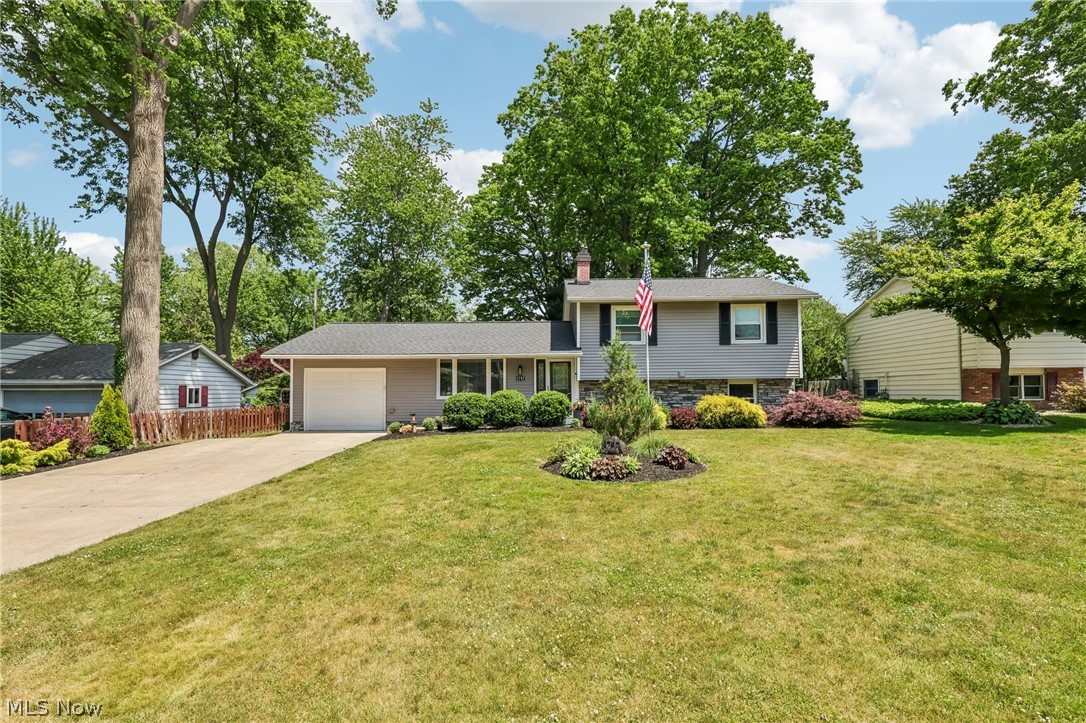 Welcome home to this charming 3-bedroom split-level residence in beautiful Madison Township! Step inside to discover a bright and inviting living room, where a large bay window fills the space with abundant natural light. The open flow continues into the dining area and kitchen, creating an ideal setting for both everyday living and effortless entertaining. Just beyond the kitchen, you'll find convenient access to the attached garage as well as sliding glass doors leading to the spacious, fully fenced backyard—perfect for outdoor gatherings, pets, play, or simply enjoying your own private retreat. The lower level offers a warm and comfortable family room, providing the perfect place to relax with a good book or spend time with family and friends. This level also features a versatile bonus room that can easily serve as a fourth bedroom, home office, craft room, fitness space, or whatever suits your needs. A full bathroom and laundry room add extra convenience to this functional living area, along with direct access to the backyard. Upstairs, you'll find three comfortable bedrooms and an additional full bathroom, offering plenty of space for family and guests. Ideally located near Tuttle Park, the shores of Lake Erie, shopping, dining, and everyday amenities, this home combines comfort, convenience, and versatility in a desirable location. Don't miss the opportunity to make this wonderful property your next home—schedule your private showing today!
