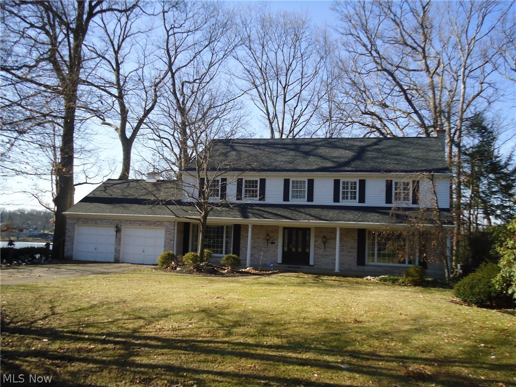 WATERFRONT 4 BR / 4 BATH HOME ON SILVER LAKE WITH SPECTACULAR, PANORAMIC VIEWS.   WELL MAINTAINED ONE OWNER HOME FEATURING SPACIOUS ROOMS AMD OPEN FLOOR PLAN.  BEAUTIFUL TILE FOYER ENTRANCE WITH TURNED STAIRCASE.  HUGE FAMILY ROOM WITH WOOD BURNING FIREPLACE, HARDWOOD FLOORING, BEAMED CEILING AND BUILT-INS........LEADING TO A MULTI TIERED BRICK PATIO WITH FABULOUS VIEWS.....A GREAT PLACE FOR OUTDOOR ENTERTAINING!!!!   LARGE LIVING ROOM WITH CROWN MOLDING.   FORMAL DINING ROOM WITH PICTURE WINDOW.  KITCHEN WITH  EATING AREA & LAKE VIEWS.   MASTER SUITE WITH DECK OVERLOOKING LAKE.  WALK OUT LOWER LEVEL REC  ROOM LEADING TO  BRICK PATIO  WITH LANDSCAPED STEPS LEADING TO LAKE......  SILVER LAKE ESTATES PRIVILEGES  INCLUDED............SWIM .....FISH....SAIL......!!!!!!  A GREAT PLACE TO CALL HOME.....CALL TODAY FOR YOUR PRIVATE VIEWING.