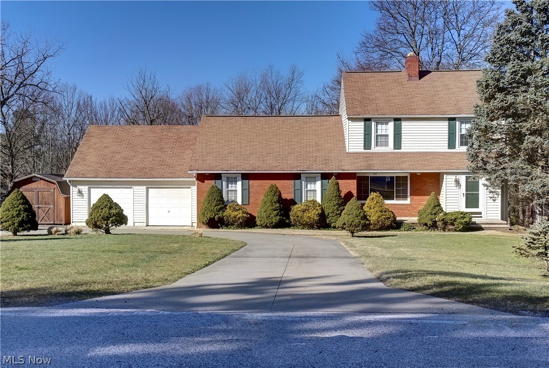 Must see 4 bedroom home situated on nearly 1.4 acres! Upon entering you will be wowed by the gorgeous stone fireplace and professionally restored hardwood floors throughout. The views of backyard from the kitchen and family room are breathtaking. Walk out on to the deck, relax and enjoy your private retreat. The oversized 29ft deep by 23ft wide 2 car garage is a dream come true! Great shed for additional storage. The walk out basement is another great bonus space with many possibilities. This home is minutes from national parks, including the Great Falls of Tinkers Creek, Viaduct Park, and Bedford Reservation, just to name a couple. In addition, enjoy the Metroparks hiking and biking trails, Shawnee Hills Golf Course and the Walton Hills Lake Club! Schedule your showing today! Additional 1 acre lot available with this home (MLS# 4261573)