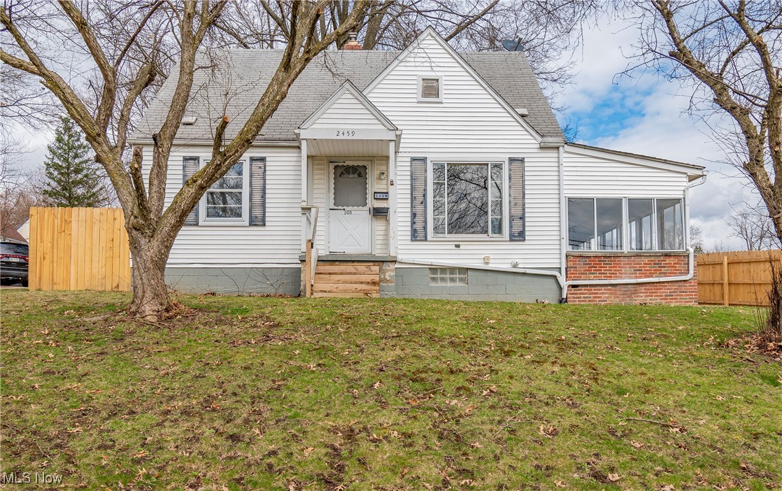 Welcome to this charming move-in-ready Cape Cod home! As you enter, you'll be greeted by a spacious living room, perfect for relaxing or entertaining guests. The kitchen boasts beautiful LVP flooring and newer stainless steel appliances, adding both style and durability to the heart of the home. On the main level, you'll find two generously sized bedrooms and a beautifully remodeled full bathroom with new LVP flooring, new shower, and new vanity. The upper level features a large and private owner's bedroom, offering the perfect retreat. The partially finished basement provides ample space for a family room, playroom, or additional entertainment area, complete with a full bathroom for added convenience. Enjoy the outdoors on the enclosed porch or in your oversized backyard with a new wood privacy fence - ideal for outdoor gatherings. Notable updates include: new furnace 2024, newer carpet, fresh paint, and a newer hot water tank 2022. Don't miss the opportunity to make this your new home!