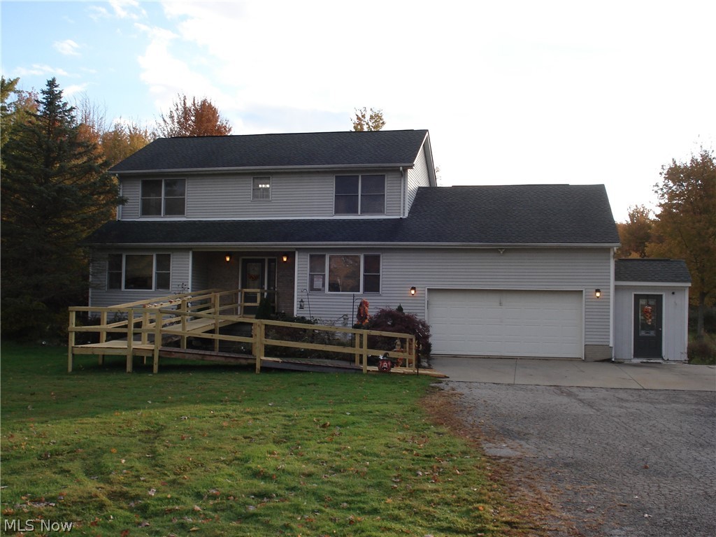 Location, Location , Location!!!!!!   4 Bedroom , 3.5 Bath Colonial on 8.1 acres in the country but close to I-90. This spacious home features huge kitchen with lots of cabinets and granite countertops and all  appliances. Step out to the rear deck and enjoy relaxing in the above ground pool or hot tub!! Walk-out basement features a wood burning stove and lots of storage room or possible additional living area. 28x32 pole building has concrete floor, electric , loft and lean-to.   Home could use a little updating but was well built and definitely a must see!!!!!