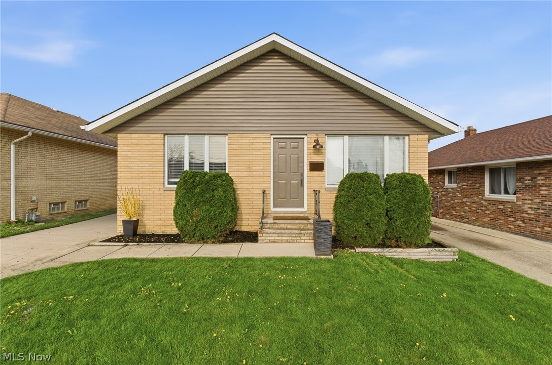 Welcome to 5284 E 102nd in Garfield Heights, a stunning Coby Socher renovation that perfectly blends modern design with everyday functionality, featuring 3 spacious bedrooms and 2 full bathrooms with first-floor living; pull up to a freshly painted exterior with new landscaping and step inside to an open-concept layout that flows seamlessly from the living room with a striking accent electric fireplace wall into an oversized dining area and a show-stopping kitchen complete with a large island, live edge countertops, and stainless steel appliances, ideal for entertaining and everyday living; the main level offers three generously sized bedrooms including a private primary suite with dual closets and a beautifully finished bathroom with a floating vanity and walk-in shower; downstairs you’ll find a massive finished basement with a fourth bedroom or office, a dedicated rec room with built-in bar, and plenty of additional space for relaxing or hosting, plus a large laundry and storage area with newer furnace, AC, electrical panel, and hot water tank; outside features include a 2-car detached garage, a deck perfect for summer BBQs, and a fully fenced backyard, all conveniently located near major hospitals, highways, and downtown Cleveland; seller has performed a general home inspection available upon request; agent is owner.
