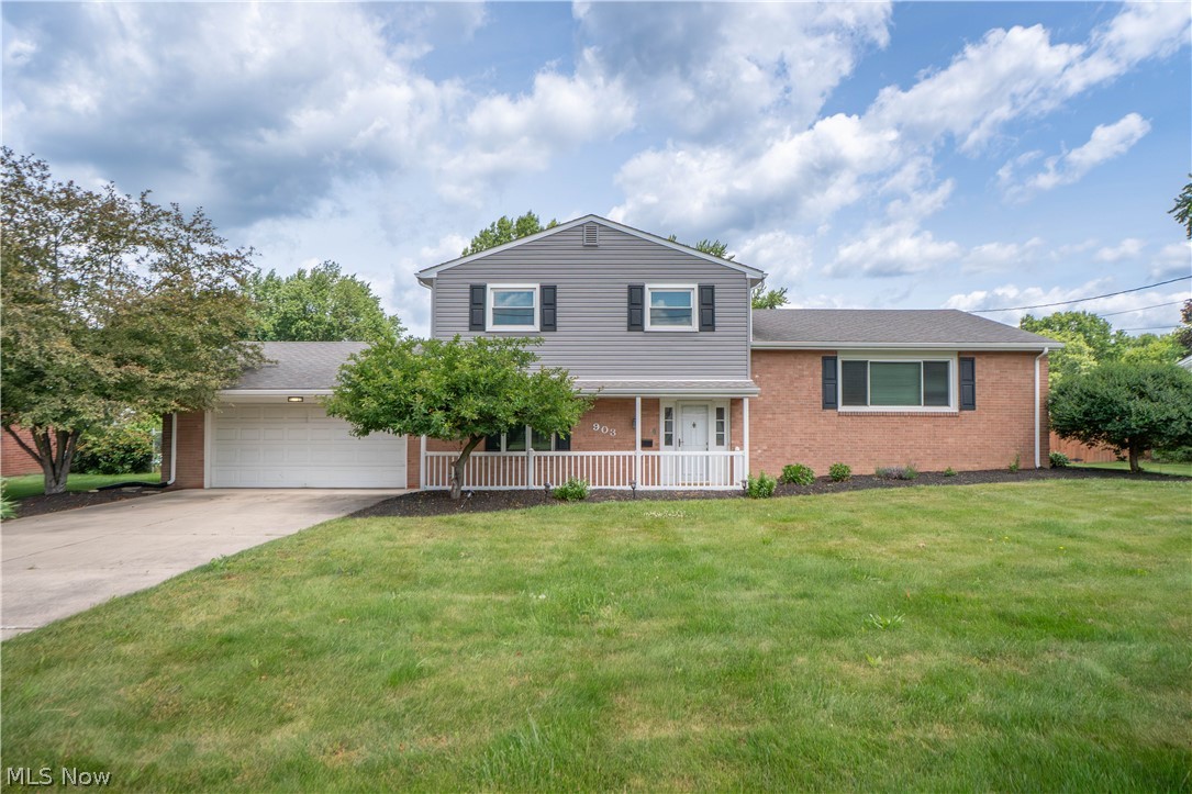 This beautifully updated four-level split offers wonderful curb appeal, a functional layout, and inviting spaces inside and out. A turnaround driveway and covered front porch create a warm first impression before entering into the spacious foyer, complete with a large closet for everyday convenience. Just a few steps up, the bright living room features hardwood floors and a large picture window, creating a comfortable space that flows seamlessly into the dining area.

The dining room opens nicely to the updated kitchen, where you’ll find abundant cabinetry, stainless steel appliances, an extended countertop  and a charming breakfast nook framed by bay windows and built-in bench seating. From the kitchen, step down into the cozy family room featuring a gas fireplace and sliding doors that lead to the enclosed porch, offering a peaceful place to relax while overlooking the backyard.

The main level also includes a versatile bedroom or home office, along with a beautifully remodeled half bath. Upstairs, the spacious primary bedroom offers hardwood floors, two closets, and a private bathroom with a shower. Two additional bedrooms and a mostly remodeled full bathroom complete the upper level, providing comfortable space for family, guests, or hobbies.

The lower level expands the living space with a finished rec room, plus a storage area under the stairs and a utility room with laundry, washer and dryer, and additional storage space. Outside, enjoy a fully fenced backyard with plenty of room to play, garden, or entertain, along with a stamped concrete patio and enclosed porch that make outdoor living easy. Additional highlights include an attached 2-car garage, attic fan, water softener installed in 2019, Furnace/AC from 2016, HWT from 2024, and triple-pane front windows that provide excellent noise reduction. A wonderful North Canton home with space, updates, and comfort throughout!