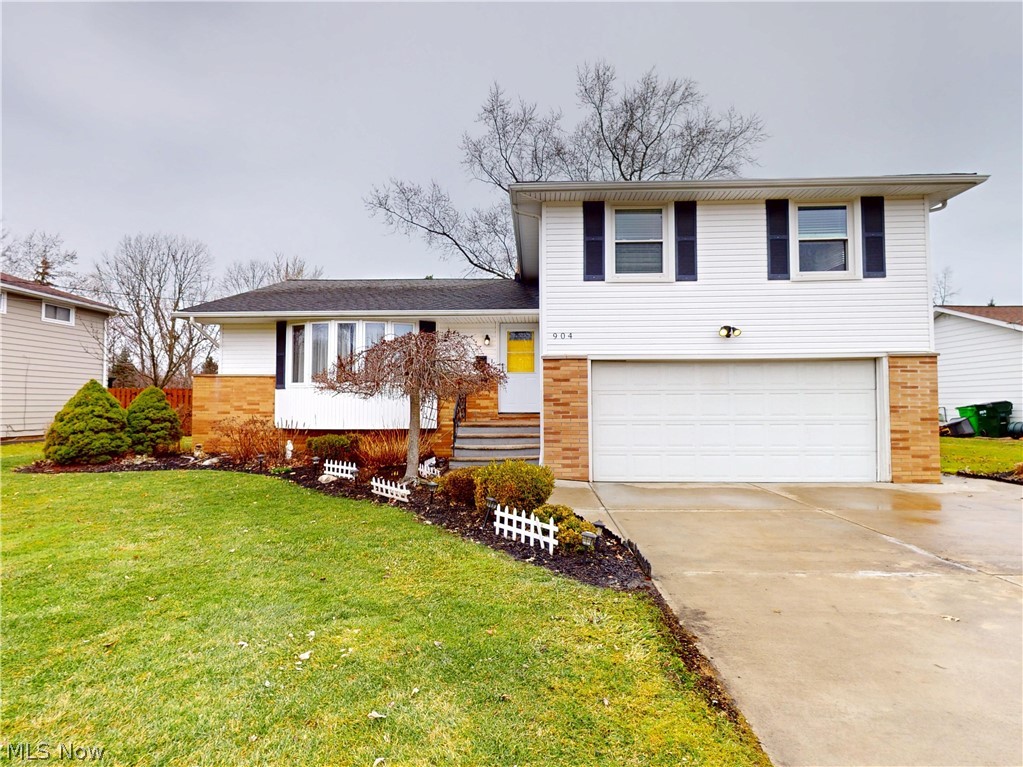 Here is an opportunity you don't want to miss! 4 bedroom 2.5 bath split level with great bones and potential. Bring your finishing touches to this beautiful home that's waiting for it's next owner. Laminate flooring runs through the first floor living room, dining room and kitchen. Upstairs, all of the bedroom have hardwood floors and are all good sized. The flow is perfect for family gatherings and entertaining. The family room has a fireplace for those evenings when you want to be cozy by a fire. Sliders out to the backyard make this a smooth transition for outdoor gatherings. The lowest level has a great space for a playroom or a workout room. All major mechanicals are newer which will give the new owner peace of mind. Don't wait, schedule your showing today!