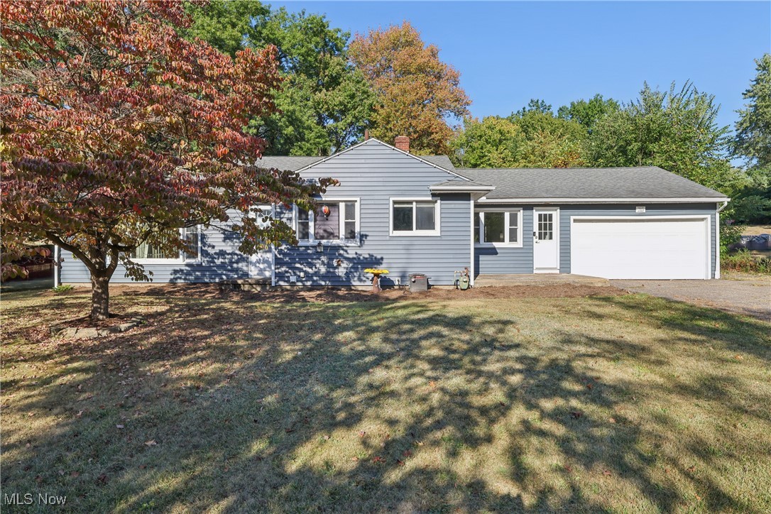 Welcome to this 3-bedroom, 1.5-bath ranch home! This rare find on almost an acre is sure to impress. As you enter, you’ll be greeted by a freshly painted family room that adds nearly 300 square feet of living space—perfect for a family room, recreation area, office, or whatever suits your lifestyle. The main part of the home features an open floor plan with a spacious kitchen (appliances stay) boasting laminate flooring and a dining area, plus a generous living room that easily accommodates a sectional, big-screen TV, and more—everything you need to make it your Home Sweet Home. Three perfectly sized bedrooms and a full bath complete the main floor.
The beyond-large basement includes a freshly painted half bath and is just waiting for your vision. Updates include roof and windows (2009), furnace/central air and hot water tank (2017), and new vinyl siding (2024).And let’s not forget the yard—what a yard! The backyard is over half an acre and extends beyond the fenced area, offering plenty of space for kids, pets, or simply enjoying the outdoors. What are you waiting for? Call today to see this home before it’s gone!