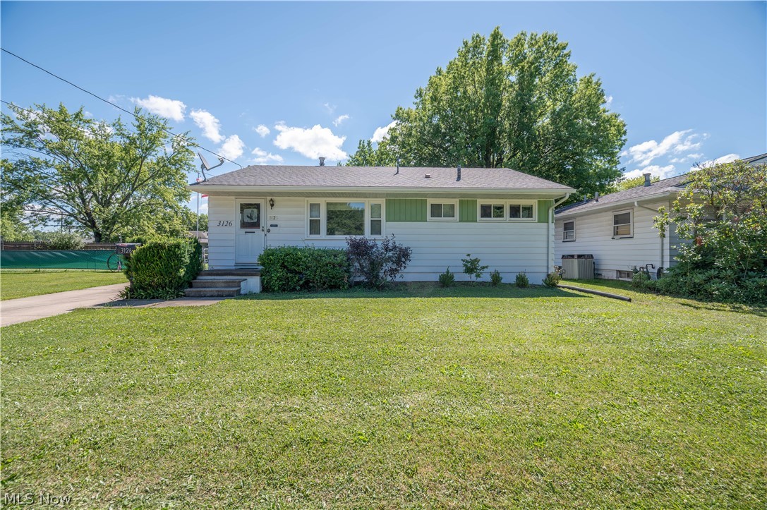 Looking for a move in ready home with an extra lot? Look no further. This cozy 3 spacious bedrooms 1 bath ranch has been well maintained and looking for new owners. The hot water tank, furnace and a/c were just installed March 2026. Basement completely waterproof with sump pump and Wall anchors in 2023 (transferrable 25 year warranty). A 12 x 20 shed was added in 2020. The 2 car garage is every man's dream--double insulated, electric, working cast iron fireplace! Roof approximately 2013, windows 2005.   Call today to schedule your private showing!
