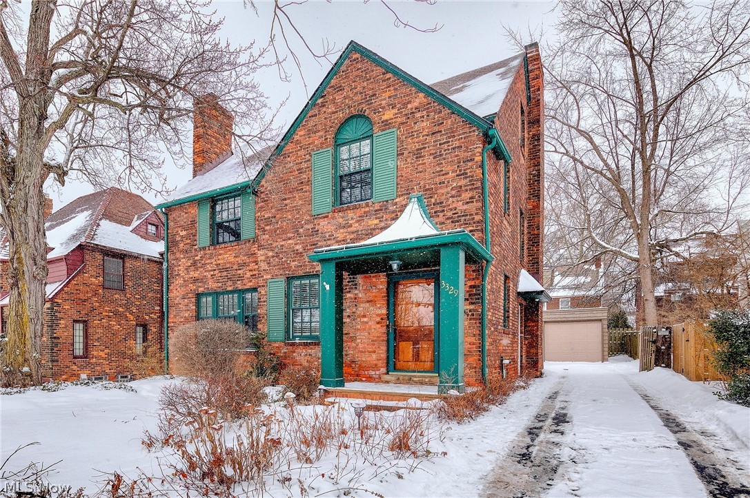Gorgeous Brick Colonial in the Fernway area of Shaker Hts is a shining penny! Architectural details & many hardwood floors throughout. Eat-in Kitchen features white wood cabinets, black granite counter tops, glass tile backsplash, buffet style cabinetry, & there's a pass through to the Family Room. Spacious Living Room w/brick surround gas fire place has built-in library shelves & opens to the Dining Room. Dining Room has crown molding with French doors leading to a large Family Room with beamed ceiling, newer carpeting & glass slider to the back paver patio & fully fenced yard. First floor has a nice updated powder room and there's a door from the Kitchen that also leads into the backyard. Upstairs there's a roomy Master Bedroom w/ a (2008) updated Master Bathroom w/a step-in shower. There are an additional 2 Bedrooms on the 2nd floor w/ ceiling fans & hardwood floors (beneath carpeting) There's even a 2nd floor balcony off of one of the guest bedrooms! There's another Full Bathroom o