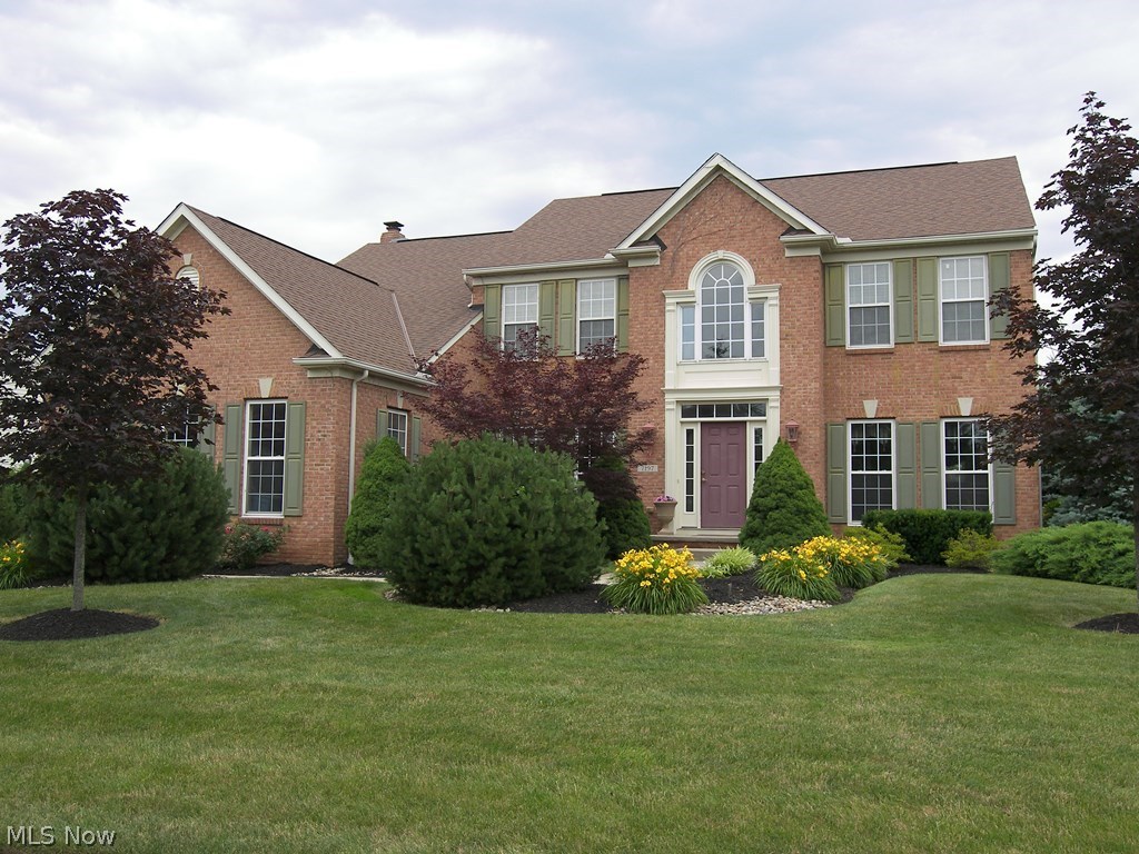 Wow – what a great location!  Move to Signature of Solon and be within walking distance to the clubhouse for golf, the fitness center, and dining rooms and lounge.  Welcome to this pretty brick front transitional style situated on a beautiful private setting, yet backing up to the second green, with great views of the golf course.  The two story foyer opens to the private office/study with French Doors and the formal living room and dining room.  The spacious kitchen with an abundance of cabinets, a center island, granite, stainless appliances is open to the wonderful family room with a stone fireplace as well as the morning room – perfect for dining or a sun room.  There are sliding doors to the patio and private backyard.  The second floor presents all bedrooms with the spacious master suite offering a beautiful bathroom with heated floors, double vanities, a whirlpool tub and two walk in closets as well as a sitting area.  The other three bedrooms and full bath are generously sized.