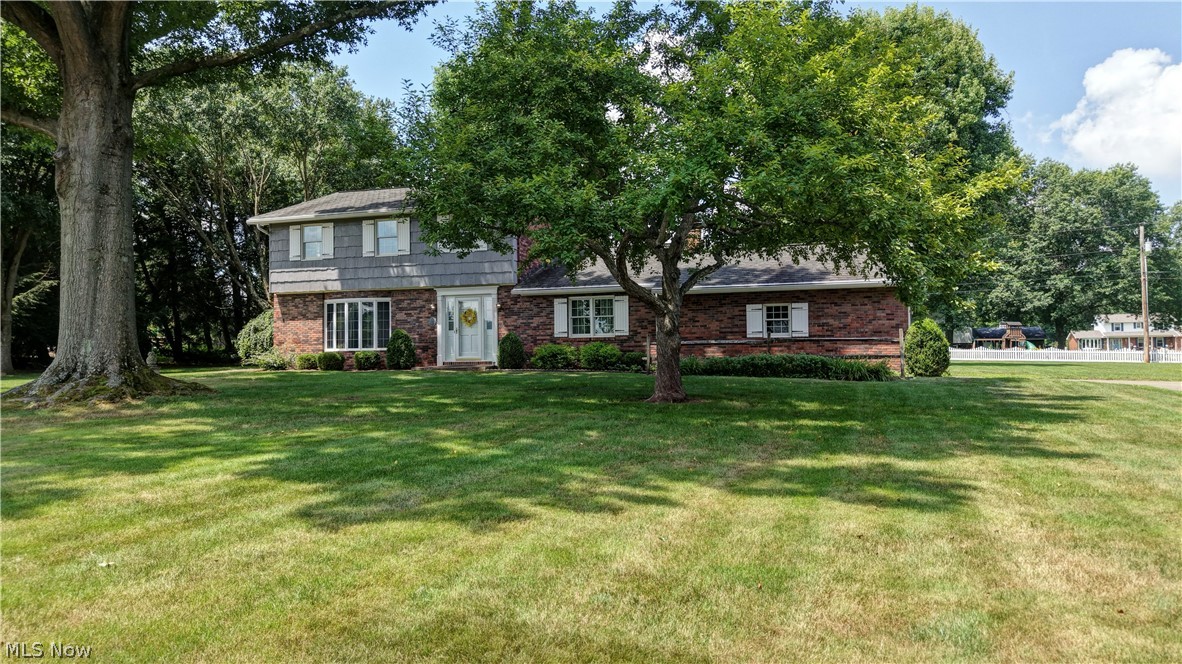 Discover the perfect home you have been searching for.  From the moment you arrive you will be greeted with the welcoming curb appeal with brick and cedar construction.  The same owner since 1978 who have meticulously taken care of this home and have created lasting memories with their family.  As you enter the front you are greeted by the beautiful foyer.  On the main level is the formal living room with bay window and dining room complete with custom oak and cherry trim throughout the home.  A large inviting family room with built-in bookshelves, patio sliding doors and wood fireplace.  Remodeled and extended kitchen with cherry cabinets and new flooring.  Included are the appliances, refrigerator, double oven, microwave and dishwasher.  A laundry room and 1/2 bath complete the main level. The 2nd level has a primary suite and primary bathroom, with his and her closets, recently tiled shower.  Two additional generously sized bedrooms are on the 2nd level.  Finished basement with a den and an office that could be used for an additional bedroom, bar, built-in bookcases and a cedar closet.  Utility room in the basement includes a freezer, screens for windows and a sink.  Reverse osmosis water system.  Anderson replacement windows.  Gutter guard spouting.  HVAC for 2nd floor new in 2026.  Utility averages:  $200.