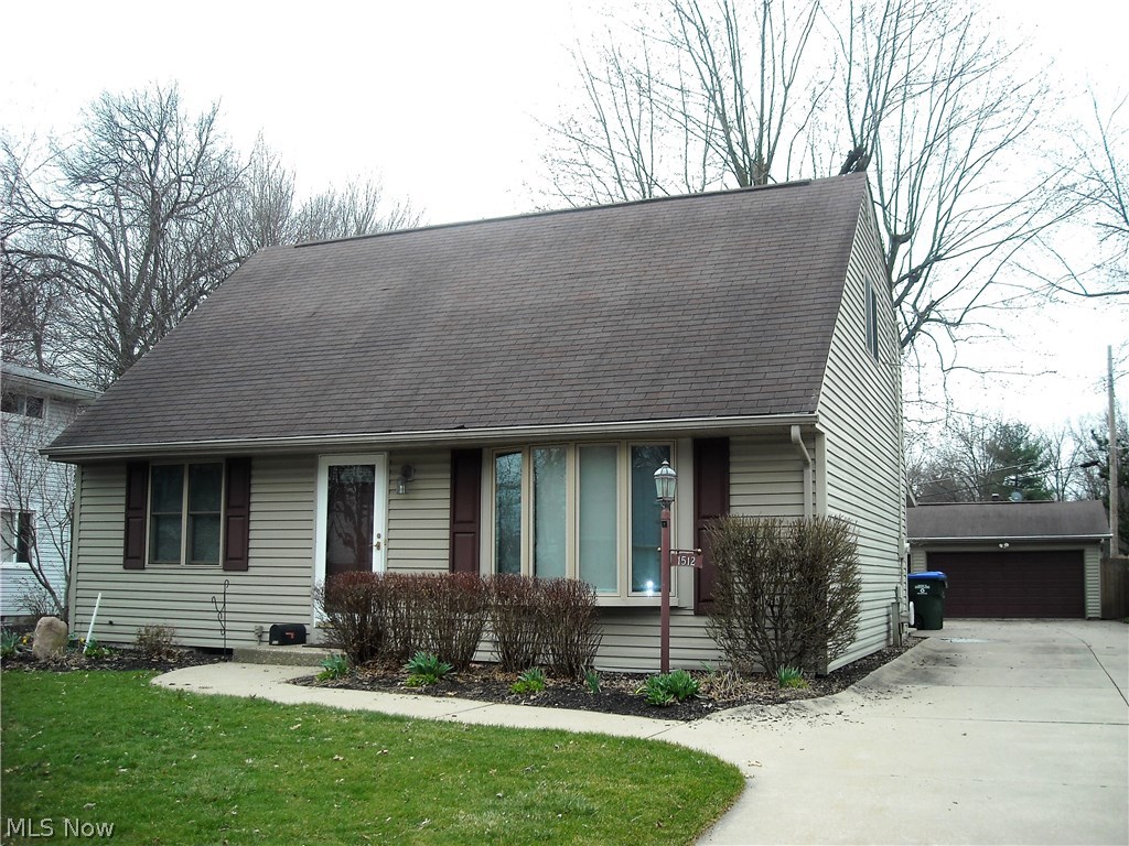 Very nice, well maintained 3 bedroom, 2 1/2 bath vinyl sided cape cod.  1st floor master bedroom with full bath.  Dining room has built-ins and sliding glass door leading to sunroom.  Two nice size bedrooms with double closets and full bath on second floor.  Finished family room on lower level. Concrete drive, fenced-in back yard and lovely treed lot.  Close to shopping, schools, golf course and city parks. Move-in ready.  Must see!