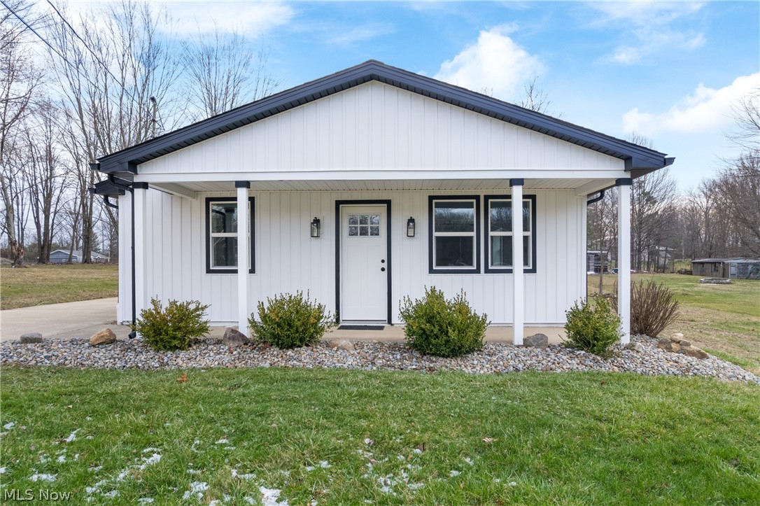 Wow! Stop The Car!  
Why build when you can move right into this completely remodeled ranch home set on a spacious ½-acre lot?
This home has been thoughtfully updated from top to bottom, offering modern comfort and peace of mind. Step inside to find a brand-new kitchen featuring granite countertops, an electric stove, dishwasher, and a stylish, functional layout. The seller expanded the home by converting the former porch into additional living space—creating a more open and usable floor plan.
Enjoy all new flooring, fresh paint, and carpet throughout, along with all new windows that bring in natural light. The home now offers 2 full bathrooms, thanks to a newly added second bath.
Major mechanical and structural updates include a new roof, new AC, new hot water tank, updated electrical, and all new ductwork. The gas furnace is just 2 years old, and gas lines have been run for efficiency. The property has also been connected to city water and sewer, with the well professionally closed.
Outside, the oversized 2-car garage is a standout feature—extra deep with an 8-foot door, perfect for larger vehicles, a boat, or additional storage. It also includes new siding, roof, electric, and a new door opener.
Additional highlights:
 • 2 bedrooms, both wired for ceiling fans
 • Cozy electric fireplace
 • Single-floor living for convenience
 • Close proximity to a boat launch

This is truly a turnkey home where everything has been done for you—just move in and enjoy! Lake View!!!! Call to schedule a showing!