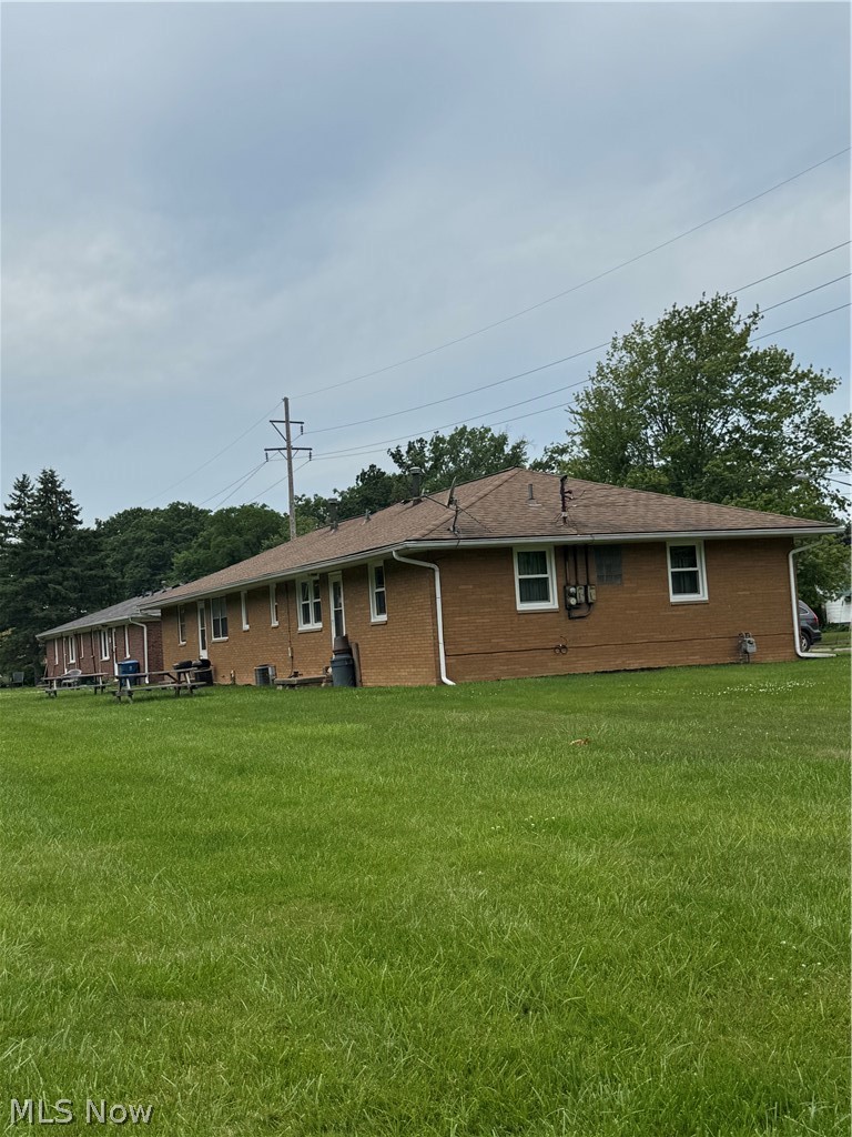 Brick ranch style duplex with center garage and each unit the same. 2 bedrooms, kitchen, eating area, living room and laundry. There is  a separate crawl space access on each side. some updates include newer windows on east side, new screen doors, 1 newer water tank. Long term renters. A good opportunity for owner occupant or investor.
Property has 2 lots. Home is on 1 lot and other is corner of 36th and Oakdale. total .25 acres.