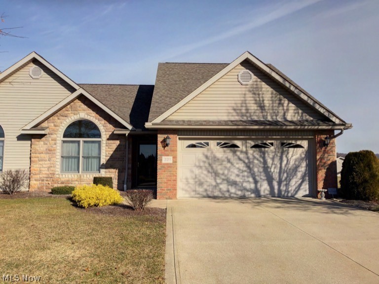 Carefree living with this well cared for 3 bedroom, 2 1/2 bath home. The front foyer opens up to the open living room.  Very nice 1st floor master bedroom with cathedral ceilings, master bath, and a huge 8 x 5 master walk-in closet. The other 1st floor bedroom includes a large decorative window.  The large kitchen has loads  of cabinet space, and the appliances are included.  The 2nd level provides a bedroom, half bath, and storage room.   The 1st floor convenient laundry also includes cabinets.  The cozy enclosed sunroom is an added feature to this lovely home.  The 2 car attached garage is immaculate.  Seller is offering a 1 year America's Preferred Home Warranty.