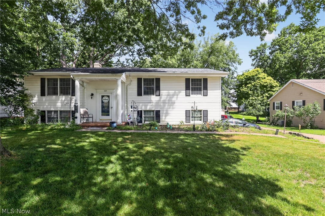 Welcome to this charming 3-bedroom, 3-bath home nestled in a well-established Medina neighborhood. Built in 1962, this inviting residence offers approximately 2,250 square feet of comfortable living space with a thoughtfully designed floor plan. The main level features a spacious living room with a cozy wood-burning fireplace, an eat-in kitchen, and generously sized bedrooms. A fully finished walkout lower level provides additional living and entertaining space, offering flexibility for a recreation room, home office, or guest area. Outside, enjoy the patio overlooking the scenic backyard on a beautifully sized 0.33-acre lot. Additional features include central air conditioning, an attached heated 2 and a half-car garage, public water and sewer, and a convenient location close to schools, shopping, dining, parks, and major commuter routes. This home offers the perfect blend of comfort, functionality, and a desirable setting.