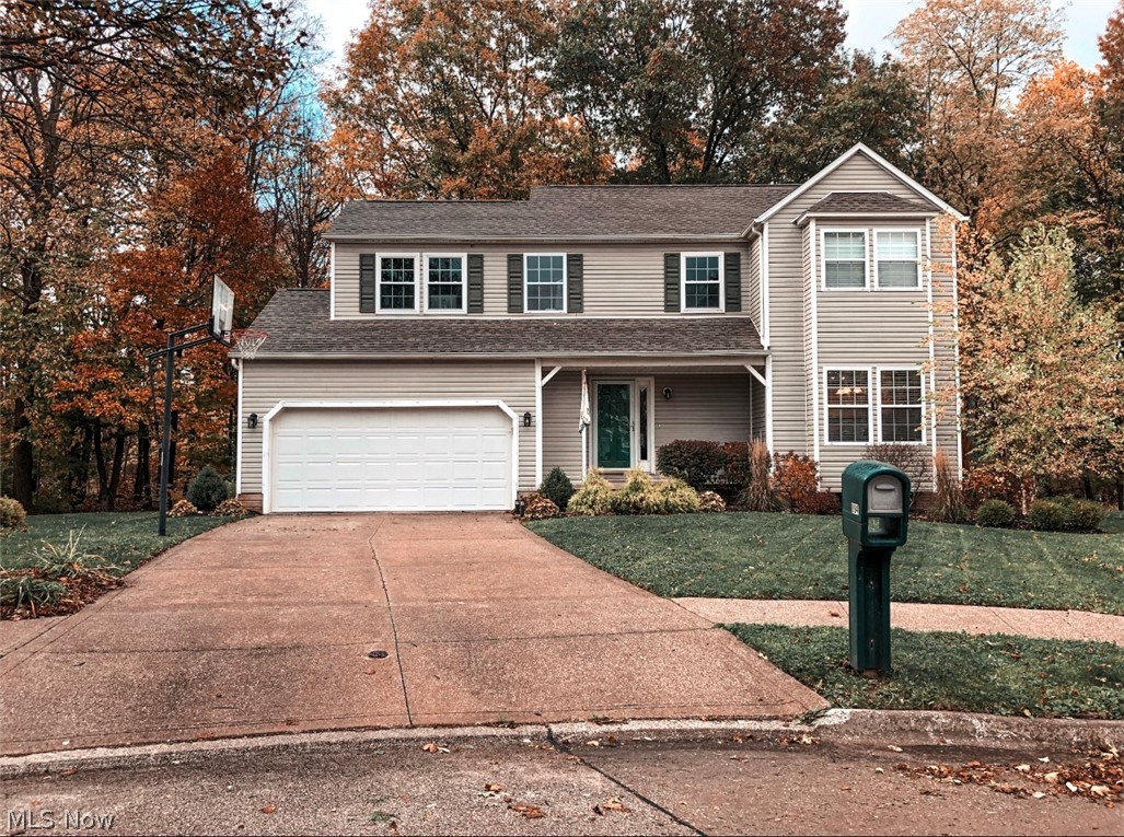 Welcome to this newly updated, remodeled Colonial in Buckeye School District. The home boasts a large open floor plan with a wood burning fireplace in the living room, a door leading to the back deck and flowing into the open formal dining area with newer, updated, laminate floors throughout the 1st floor. Kitchen has new counter tops, newer stainless steel appliances, a new composite sink, freshly painted cabinets and includes an eat in kitchen with island seating as well. The 2nd floor offers three nicely sized bedrooms with plenty of closet space, including the master suite with spacious private bath, cathedral ceilings, his and hers closets and a stunning view of the picturesque backyard. The basement has ample storage space and is pre-plumbed for a bath, ready for your personal finishings. This home gives you a private, country feel in a small development, community setting. Development also offers an adorable park and walk/run path for all families to enjoy! Some of the improveme