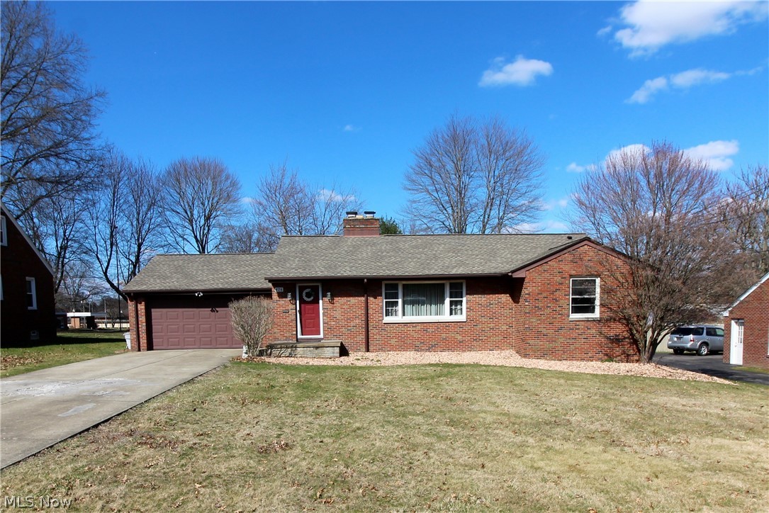 BEAUTIFUL BOARDMAN BRICK RANCH!!! This WELL MAINTAINED home features large Living Room with hardwood floors, coved ceiling & corner fireplace; Family Room overlooking backyard with large storage closet & newer carpeting (2018); Dining Room with hardwood floor; Kitchen with all appliances, newer countertops & hardwood floor; Master Bedroom with large closet & hardwood floor; Two Additional Bedrooms with hardwood floors; Two Full Bathrooms; Full Basement with glass block windows & Half Bathroom; Rec Room with fireplace and Attached Two Car Garage with new door opener (2019). Updated items include: electric box, hot water tank, roof shingles (2010) and landscaping. Sellers are including an AHS Home Warranty for one year!  Call today to schedule your showing of this WONDERFUL HOME!!