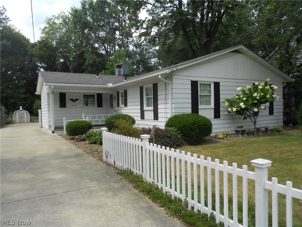 Location, Location, Location!  Desirable ranch has a contemporary feel in the heart of Stow.  This 3 bedroom, 2 full bath home features a two sided gas fireplace to enjoy from both the living room and the eat-in kitchen.  White cabinetry and plenty of counter space can be found in the eat in kitchen (all appliances stay).  Both the living room and master bedroom are accented with crown molding.  All three bedrooms have nice closet space and the main bath offers a linen closet and large vanity with double sinks. The finished basement is an added benefit with rec room with surround sound, full bath, bonus room, laundry and workshop.  A shed, 12 X 12 deck with built-in bench and partially fenced in backyard.  Newer windows (2013) and newer garage door (2014) are just a few of the updates in this well maintained home.  The TV and stereo equipment in the recreation room will stay with the surround sound (no value added).   Close to Holy Family, restaurants, and shopping.