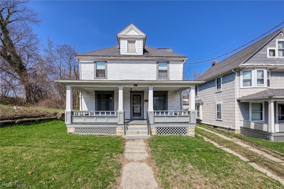 Step into the timeless charm of this stately Akron Four-Square, located just blocks from the heart of Highland Square. Built in 1910, this spacious home offers more than 2,200 square feet of living space, showcasing beautiful original woodwork throughout and over a century of history.

Once operated as a boarding house, the home's character remains beautifully preserved. The expansive second-floor landing welcomes you to bedrooms that still feature their original locks and keys, offering a glimpse into the past. Imagine residents gathering for meals in the formal dining room or spending warm evenings visiting on the generous front porch.

In more recent years, the property served as a single-family rental, and a full bathroom was added to the main floor for added convenience. Major updates include a newer roof and updated electrical panel, and the finished attic provides additional flexible living space.

With thoughtful updates and a little TLC, 62 N. Balch Street presents a wonderful opportunity to restore this historic beauty to its former glory while making it your own.

For sale only; not for rent.