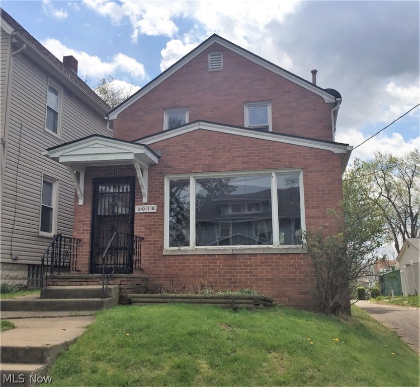 2 bedroom 1 bath brick colonial located on a corner lot near many amenities and highway. Will make a charming home with some TLC.