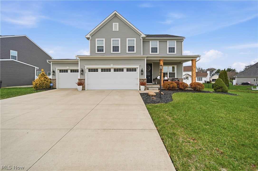 Welcome to Alloway Meadows in North Canton City School District! This beautifully maintained 4-bedroom, 3.5-bath home offers the perfect blend of style, comfort, and functionality. The open-concept main level features a stunning kitchen with granite countertops, abundant cabinetry, and plenty of space for gathering and entertaining. Step outside to the spacious deck overlooking the fully fenced backyard—perfect for summer cookouts, pets, play, or relaxing evenings outdoors. Upstairs, you'll find the conveniently located second-floor laundry along with an incredible primary suite that truly feels like a private retreat. Enjoy a spacious sitting area, an oversized walk-in closet, and a luxurious ensuite bath designed for everyday comfort. Three additional bedrooms provide plenty of room for family, guests, or a home office. The finished basement adds even more living space and includes a full bathroom, making it ideal for a recreation room, home gym, media room, or guest suite. Completing the home is a sought-after 3-car attached garage, offering ample storage and room for hobbies. Recent updates include GE Cafe line kitchen appliances (2024), Irrigation system installed (2026). Conveniently located near shopping, dining, parks, and highway access, this home is ready for its next owners to move in and enjoy.