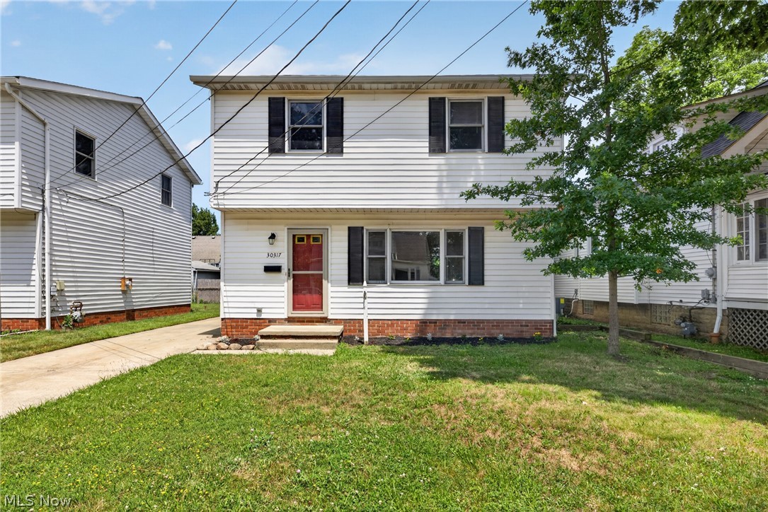 Move right into this well-maintained 3-bedroom, 1.5-bath Colonial built in 1990! Major updates completed in June 2026 include a new roof on both the home and detached garage, a new remote-controlled skylight, and a new hot water tank. The spacious eat-in kitchen features a walk-in pantry, as well as new kitchen and utility faucets. The updated half bath includes a new vanity and faucet. Beautiful Luxury Vinyl Flooring flows throughout the first floor. Patio slider opens to a wood deck overlooking a lower deck, creating great outdoor living space. A separate concrete patio is already wired for a hot tub, offering the perfect spot to create your own backyard retreat. Generous bedroom closets provide excellent storage throughout. 

Conveniently located close to shopping, restaurants, and highway access for an easy commute. Enjoy the nearby lakefront park at the end of E.305th Street, featuring scenic views, beautiful sunsets, recreational amenities, and a rentable pavilion that's perfect for graduation parties, birthday celebrations, family gatherings, and other special events. Just east of 305th Street, a convenient pathway to Manry Park provides easy access to Royalview Elementary School and Willowick Middle School. This move-in-ready home offers the perfect combination of comfort, updates, and an exceptional location!