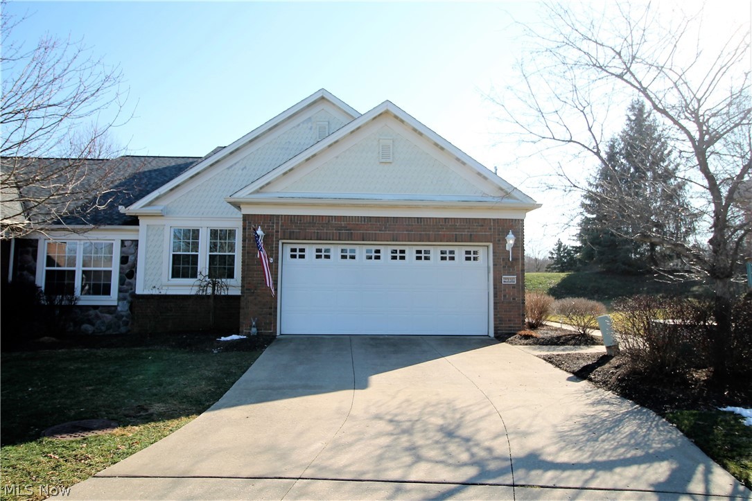 Don't miss this gorgeous, stunning ranch offering two bedrooms, and two full baths. As  you enter through the front door you are greeted by a bright and charming open floor plan, family room and eat in kitchen. Family room has a gas fireplace, vaulted ceilings, and new storm doors to allow natural light to shine through providing easy access to the fabulous back patio (2016) which has exterior lights, and can be used for all of your entertaining needs. The bright open kitchen offers abundance of cabinets and counter space, stove, dishwasher, fridge, garbage disposal (2010), new faucet (2019), eat in area and was freshly painted (2019). The large master suite has full bathroom with double sinks, custom mirrors, garden tub and shower, walk in closet and new fan. There is a second bedroom with full bathroom in the hallway. The attached two car garage offers built in shelving units, water with drain and pull down attic for storage. So many updates include roof (2018), new furnace and A/C (