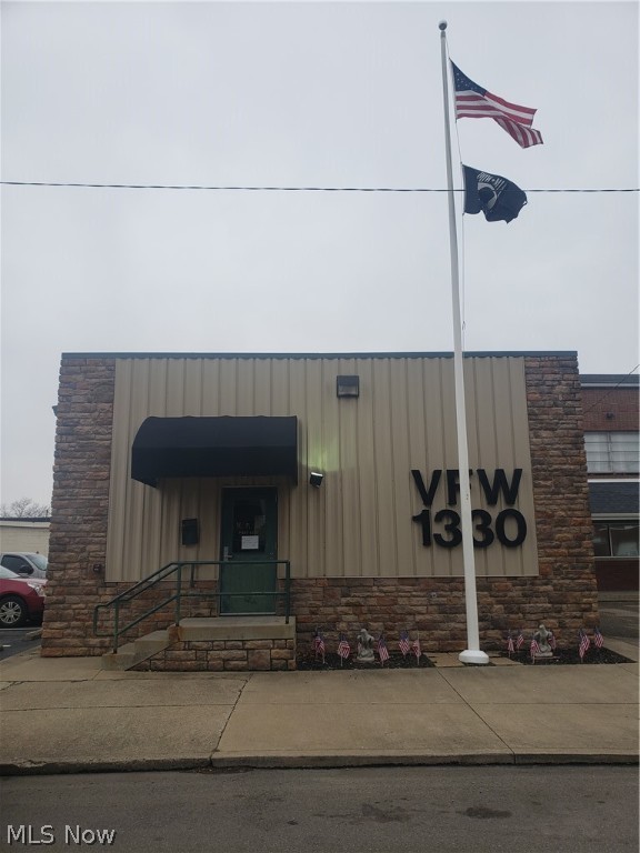 Commercial Building built in 2007 is now available for purchase from motivated sellers with a fantastic commercial list price. This 3,400 square foot building is priced to move quickly and sellers are looking for an offer! Located in Historic Downtown Coshocton, this turn-key building can continue as a pub or operate as a full restaurant bar and grill as it is fully furnished and ready. Inside you will find that this property boasts long bar seating over 20 people, along with plenty of table seating, a large stage, public men and women restrooms, as well as a fully equipped commercial kitchen including a commercial fridge & commercial freezer, full size office, utility room, and 3 phase electric. Updates throughout include but are not limited to new insulation and updated gas & electric furnaces. There is a shed in the back parking lot that will convey to the new owners. There is currently an active security system that will stay with the property and convey to the new owners. Contact