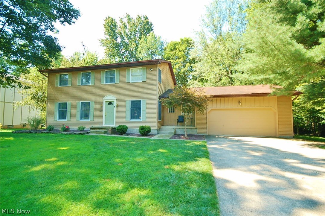 Great house, Great location!! If you're looking for plenty of room, then check out this large 4 bedroom, 2.5 bath Colonial. Nice, neutral, tasteful and neat as a pin, this home is move in ready! This beauty has plenty to offer including: Large family room with wood burning (with gas starter) fireplace; Formal dining and living rooms; Big, bright eat in kitchen with durable laminate flooring; 1st floor office with direct access to front porch; 1st floor laundry with adjacent half bath; Large master suite with walk in closet; Finished rec room in basement; 200 AMP service panel; BRAND NEW DECK overlooking a gorgeous wooded back yard complete with meandering stream and polymer storage shed; There is plenty to like here! Come and see for yourself!