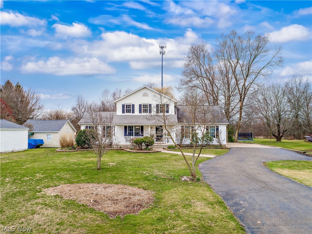 Finally, a 4-bedroom home with plenty of space, gorgeous, tasteful updates, and room to roam in New Franklin! You and your family will breathe a breath of fresh air the moment you walk through the front door. This home sits on a nearly ¾ of an acre lot and has been transformed from a dark reminder of 90s design faux pas, into a bright, elegant, visually pleasing open concept with all the right modern design choices. The wide open first floor is a crisp, clean, reminder that nearly everything is new, from the fresh paint over every inch to the vinyl floors that span the main floor, newly painted kitchen cabinetry and brand new countertops, new stainless appliances, new light fixtures and ceiling fans throughout, new doors and hardware, to the 3 completely renovated bathrooms, this home just feels right.  You’ll love the first-floor laundry/mud room off of the kitchen and adore the adjoining hall tree that boasts a bench made from a 500 yr. old tree and used as part of a cattle station i