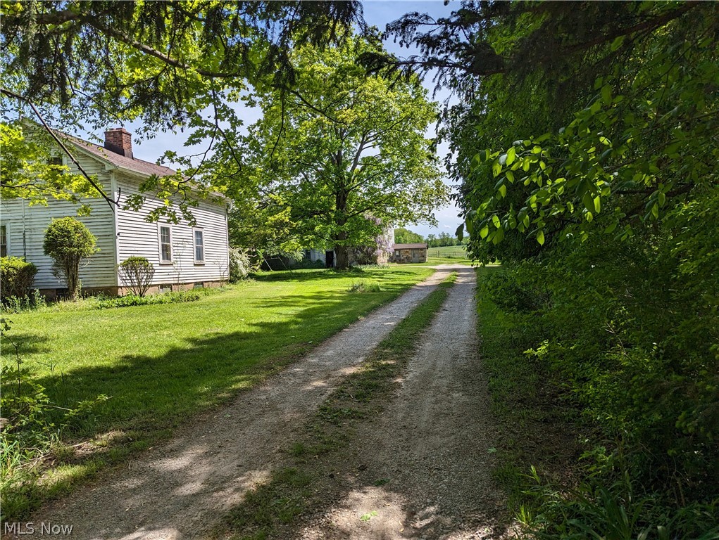 Do NOT pull in or turn around in drive- This is a shared drive with an alarm goes off in the other house on the property. This is a shabby chic farmhouse style cottage on a big farm property. You have your own person back yard surrounded by woods and bushes and includes a storage shed for yard tools and your mower. The home has an eat-in kitchen (owner can provide a table and chairs if desired). There is a couple of steps up to the hallway leading  to  door to the back yard, the full bath with tub/shower and  the living room with built-in book cases, cedar lined window seat and 2 closet. On the landing at the top of the stairs is 2 small rooms. The slightly smaller one has a closet and the other is an office. IF you go up  a few more stairs you have an open loft like bedroom (no wall or door on stairwell side. This room has 2 small closets and a bench seat with extra storage. One side of windows overlooks your private yard that you have to mow and the back side overlooks farmfield. The partial unfinished basement has the washer and dryer for use. This is a shared drive with designatated tandum parking for 2 cars. You get the carpart bay closest to the road. No use of the barn and outbuidlings and absolutely NO smoking on the property. Please note if you have allergies to cats or hay this may not be the property for you. Private showings with min of 2 hours notice please.