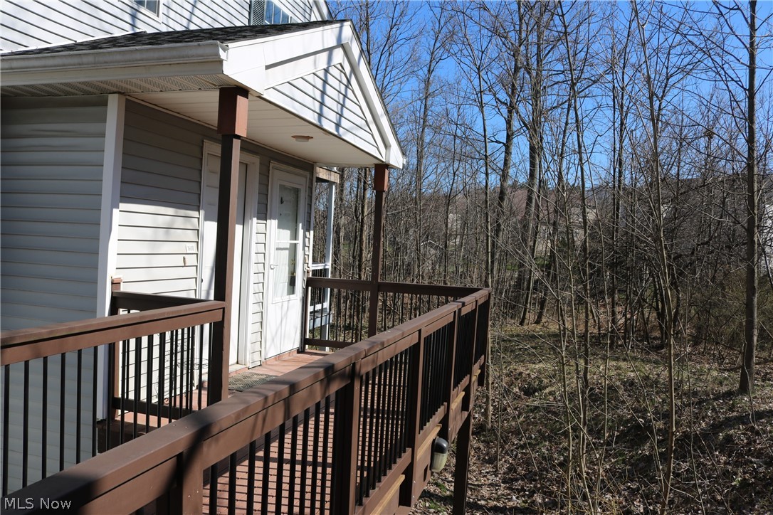 OHIO STAY AT HOME RULES ALLOW ME TO SHOW THIS PROPERTY. First-floor ranch condo that includes a 2-car garage!!  Very convenient only one step up from the sidewalk to this great condo.  Very maintained!  Large living room with a wood-burning fireplace.  March 2020 new stacked washer/dryer in the in-suite laundry. 2018 new carpeting.  Stainless kitchen appliances all less than 2 years old.  GRANITE counters in the kitchen, breakfast bar, and both full baths counters are GRANITE.  Great usable breakfast bar and dining area with windows on two walls to look out and to bring in natural lighting. Both roomy bedrooms have walk-in closets. This unit is located at so you have great wooded views from the windows and while enjoying the patio you will have lots of privacy.  Stoney Run does have a community clubhouse.  Great price in Broadview Hts and the Brecksville/Broadview Hts school district!  Set up your private showing while it's available!  Garage spaces 19 & 20.  You can choose to purchase
