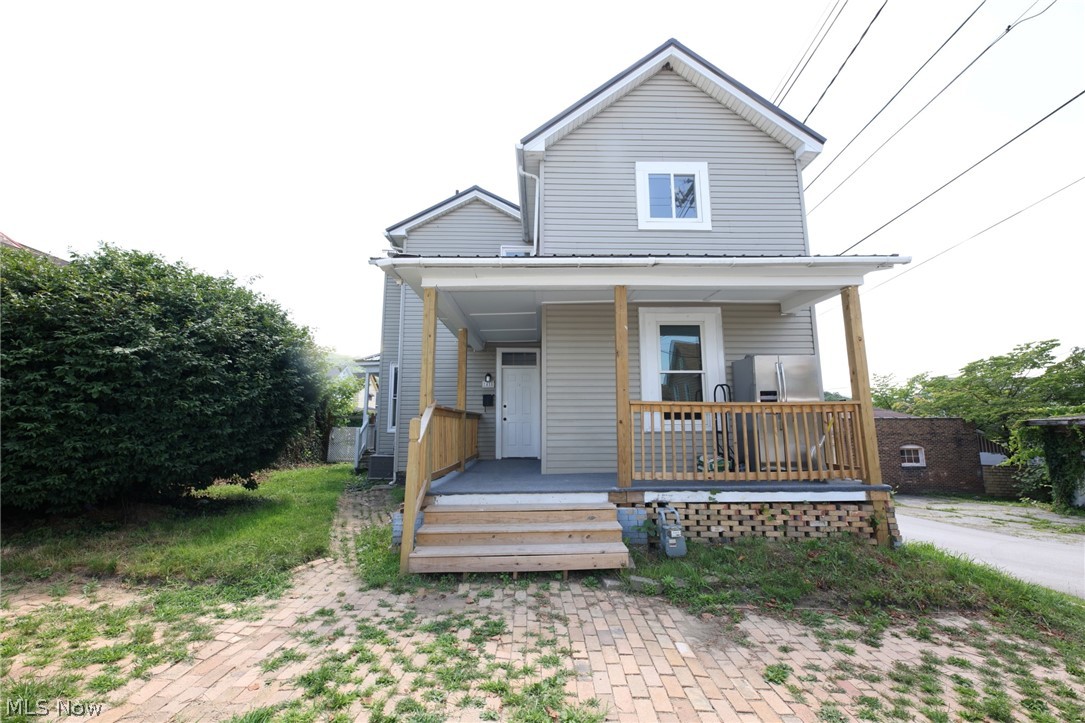 Divorce your landlord, lawnmower, and big yard headaches! This beautifully remodeled classic home sits on a charming, flat corner lot in the heart of downtown Chester, blending old-world character, modern updates, and easy low-maintenance living. The tiny yard is just enough for a hot tub, child’s pool, swing set, or smaller pets—without hours of mowing. Leave the lawnmower behind, grab a weed whacker, and enjoy walking to nearby stores, grocery options, drugstores, eateries, restaurants, and downtown conveniences.

Step onto the welcoming covered front porch and into a beautiful old-world foyer filled with charm, featuring built-in bookshelves, display shelving, and seating—the perfect spot to take off your shoes, pause, or relax with a good book. Inside, fresh neutral paint, crisp white trim, updated flooring, and natural light from vinyl windows create a bright, clean, move-in-ready feel.

The spacious living room flows into a flexible adjoining space that can serve as a formal dining room, sitting area, office, playroom, or be adapted as a first-floor bedroom for those seeking main-level living. A newly added full bath off this area adds convenience and function.

The kitchen will make any home chef happy with plenty of counter space, new cabinetry, updated counters, modern fixtures, stainless appliances including refrigerator, stove, microwave, and dishwasher, plus white cabinets, black hardware, modern backsplash, & updated flooring.

Upstairs are three spacious, newly remodeled bedrooms with fresh walls, neutral colors, updated flooring, and great natural light, along with a second updated full bath. Major improvements are already done, including a new metal roof, updated 200-amp electric, new central air, updated furnace, new flooring, fresh walls, newer windows, brand-new kitchen, and added second bathroom. If you are tired of rent, yard work, constant projects, and driving for errands, this downtown Chester home is ready for you!