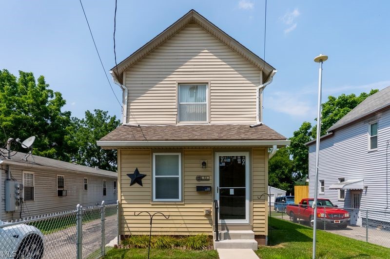 Welcome to 71 Elm Street in Struthers! This charming 2-bedroom, 1-bath home offers comfortable living with features that make it easy to enjoy both indoors and out. Relax year-round in the enclosed front porch, perfect for morning coffee or unwinding at the end of the day.

Inside, you'll find a functional layout with inviting living spaces and two comfortable bedrooms. Step outside to the back deck, an ideal spot for entertaining, grilling, or enjoying your backyard.

A standout feature of this property is the spacious 2-car detached garage, providing plenty of room for parking, or storage. Whether you're a first-time homebuyer, looking to downsize, or searching for an investment opportunity, this home offers great potential in a convenient Struthers location.

Don't miss your chance to make 71 Elm Street your new home—schedule your private showing today!