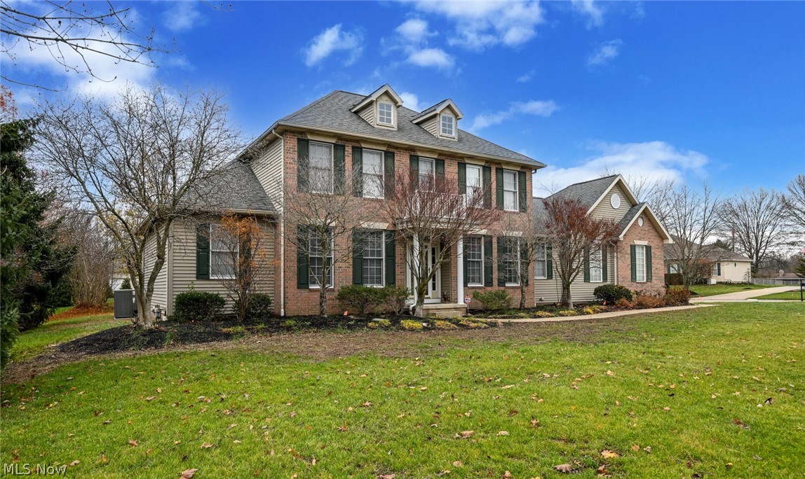 Lovely custom built brick home in sought after Century Village. This home offers the ease of a large first floor master bedroom suite that features a bath with Jacuzzi tub, separate shower, double sink, and walk-in closet. Beautiful, sunny kitchen with lots of built-ins, center island, large pantry, and dining area with access to the rear patio and fenced back yard. Stunning two story great room with fireplace and floor to ceiling windows. Spacious formal dining room with hardwood floors. First floor office. The second story features two large bedrooms with a Jack and Jill bath, huge cedar closet, and loft area with built-in desk/cabinetry. 2 car attached garage with second access to the basement. Separate single car garage with extra storage area. Neighborhood offers a HOA with lawn care services and snow removal. Quiet, convenient location close to restaurants, banking, shopping, and more. Everything you're looking for and more!