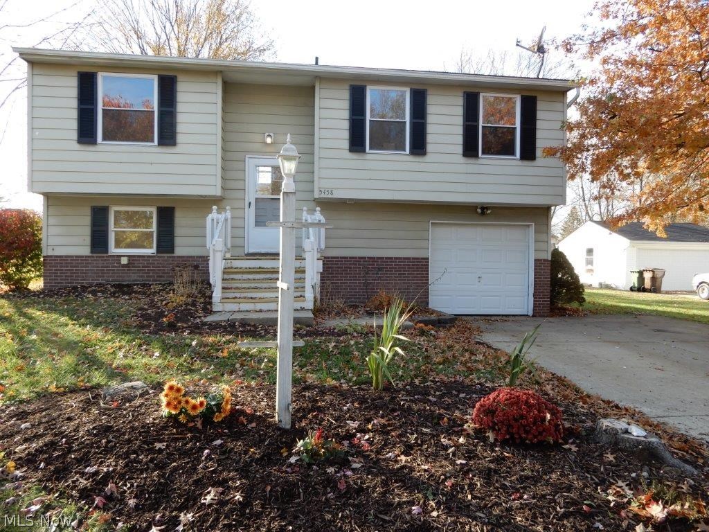 Gorgeous move-in ready 4 bedroom, 2 full bath Stow bi-level!  Don't miss out on the opportunity to own this beautiful home at a great price point!  Recent updates include all new carpeting (whole house), interior completely repainted in neutral decor, new central air 2017, front steps re-built 2017, roof 2011, and fresh landscaping/mulch!  The main floor features a kitchen/dining room with ceramic tile (kitchen cabinets painted 2017), formal living room, 3 bedrooms and a full bath!  Downstairs you will find a 4th bedroom, additional family room/office/rec room, another full bath, basement with laundry area and additional storage!  There is a one car attached garage, great deck for entertaining that overlooks a spacious flat yard. Don't let this one pass you by, schedule your appointment today!