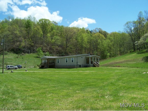 Below current appraisal. 4 yr. old Immaculate home 50 Acres. 2,100 sq. ft. 3 bdrms., 2 1/2 baths. Open floor plan/kitchen/dining room/family room. Kitchen beautiful cabinetry, island bar, formal dining room, family room w/wood burning fireplace, central heat/air. Family room, end deck for relaxing. Spacious master bdrm. w/private bath, his/hers vanity, garden tub, shower, 5x15 walk in closet. Spacious laundry room w/storage, newer washer & dryer. 1/2 bath,laundry room. Covered front porch, garden area, pasture, meadow, stream, barn, storage building. Hunting shack, tree stand, excellent huntin  Elem: Spencer  Elem/Bus: Y  JrHigh: Spencer Middle  JrHigh/Bus: Y  High: Roane County  High/Bus: Y  Fire: VOL  Police: SHF  ;SQFT=Fin L1:2100, Fin Above:2100, Fin Total:2100, Unfin Above:0;PRKG= Off Street