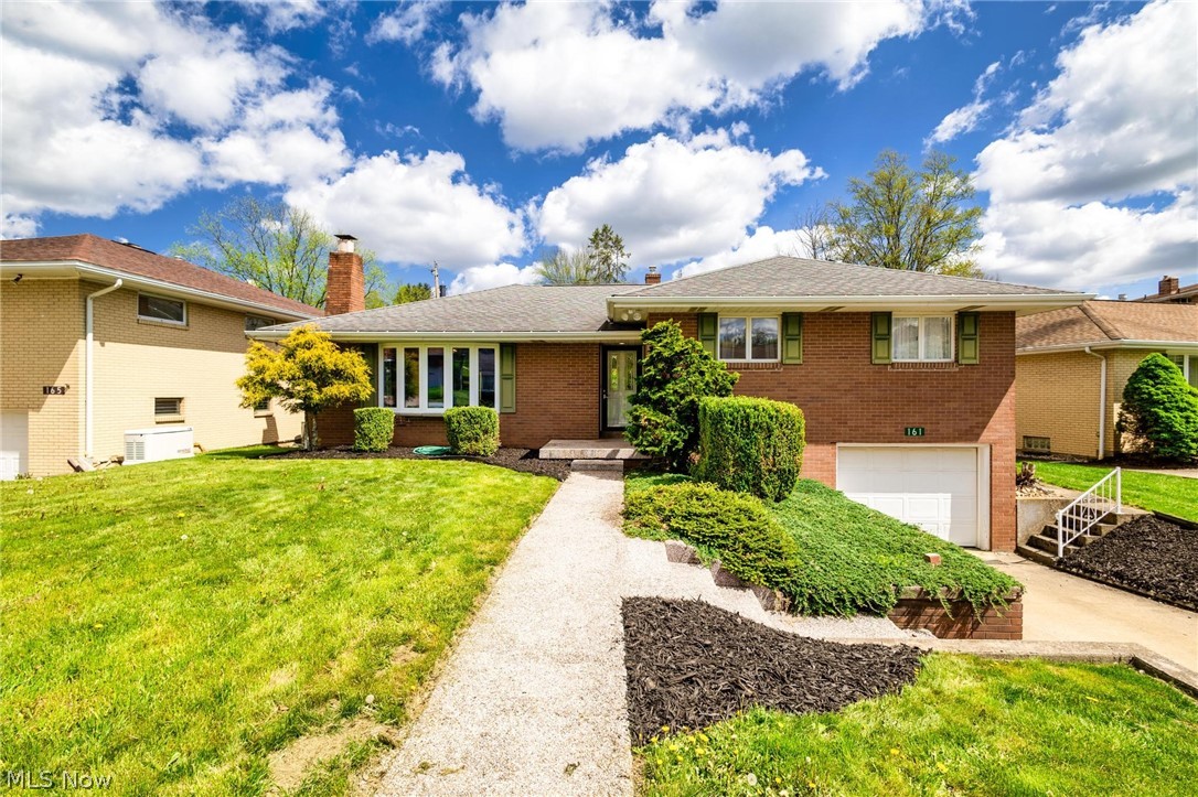 *BOM AT NO FAULT OF HOME OR SELLER *ELEVATED LIVING, EXCEPTIONAL LOCATION! Experience refined living in this exceptional tri-level residence, ideally situated in one of Wintersville’s most sought-after neighborhoods. Lovingly maintained and held by just two families since it was custom built in 1960, this home offers a rare blend of heritage, quality, and modern sophistication.  At the heart of the home, the dramatic great room showcases a striking beamed vaulted ceiling, creating an impressive yet inviting space for both everyday living and elegant entertaining. The kitchen is appointed with premium Schrock cabinetry, delivering timeless craftsmanship and functional design, complete with additional area for coffee/wine bar.  Upon entry the seamless living and dining room combination offers effortless flow.
The primary suite features generous his-and-hers closets, complemented by a beautifully updated upper-level bath with a quartz double vanity, blending style with comfort.  Designed for both relaxation and versatility, the lower level presents a warm and inviting rec room anchored by a wood-burning fireplace, along with a flexible space ideal for a home office, additional bedroom, or personalized retreat. A full bath with walk-out access enhances convenience and guest accommodations.  Step outside to your newly remodeled outdoor living area and expansive deck—an ideal setting for upscale entertaining or quiet evenings. Additional highlights include an attached garage, upgraded 220-amp electrical service (2026), and fully paid solar panels, offering both efficiency and long-term value.  A rare offering that combines enduring quality, thoughtful updates, and an exceptional location—this is a home that truly stands apart.