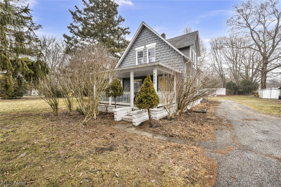 Don't miss this move-in-ready home featuring a main-floor bedroom, full bath, and laundry, with three additional bedrooms and a half bath upstairs. Enjoy outdoor entertaining on the deck or around the fire pit. An oversized detached garage offers space for a workshop, hobbies, or extra storage. Includes a new furnace and a seller-provided home warranty. Conveniently located near everyday amenities.