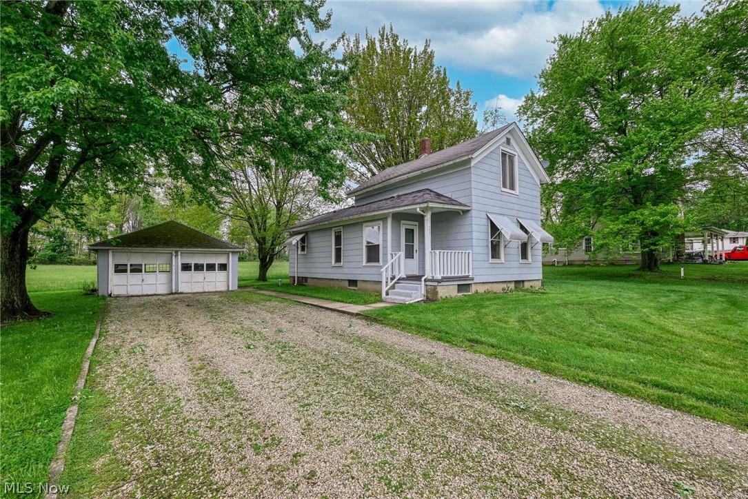 Charming century home situated on .67 acres near the center of Randolph. This 2-bedroom, 1-bath home offers plenty of character and space, featuring a large eat-in kitchen, dining room, spacious living room, and convenient first-floor bedroom. Newer flooring adds an updated touch while maintaining the home's classic charm.

The upper level includes a second bedroom and additional flexible space. Enjoy year-round comfort with central air conditioning. Outside, you'll find a 2-car detached garage and an open pavilion perfect for outdoor gatherings, entertaining, or relaxing evenings. Conveniently located close to town amenities while still offering a spacious country feel.