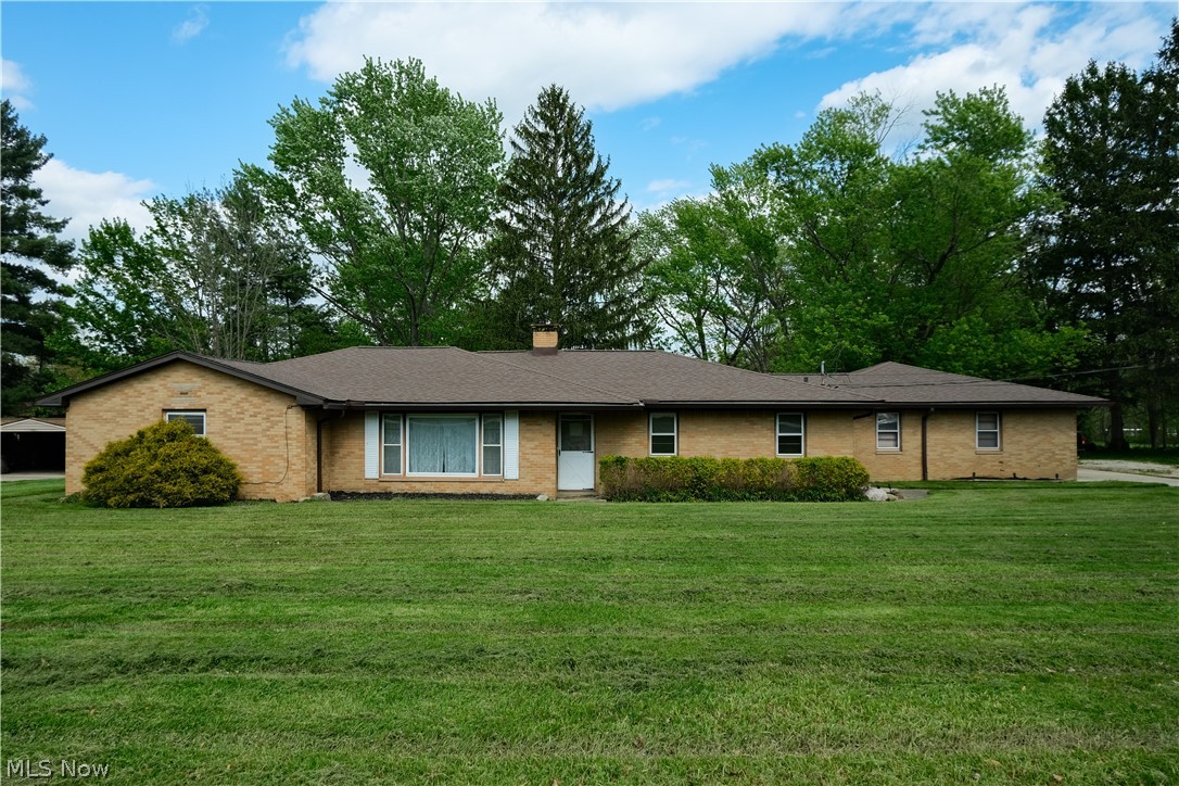 Discover the perfect blend of comfort, privacy, and modern convenience in this beautifully updated brick ranch set on more than five peaceful acres. This property offers a rare combination of single-level living, scenic land, and versatile spaces suited for a wide range of lifestyles from those seeking a quiet country retreat to buyers wanting room for hobbies, animals, or storage. A serene private pond enhances the setting, providing a picturesque backdrop for outdoor enjoyment, fishing, or relaxing by the water. The substantial barn adds even more value, offering excellent possibilities for workshop use, equipment storage, or conversion to suit your individual needs. Inside, the home features an updated kitchen with modern finishes, quality cabinetry, and ample workspace, making it ideal for both everyday meals and entertaining. The refreshed bathrooms provide a clean, contemporary feel with updated fixtures and thoughtful design. The home's brick construction contributes to long-lasting durability and low maintenance, while the ranch layout ensures easy flow between living spaces. Large windows throughout invite natural light and offer views of the surrounding acreage. This property provides abundant room to garden, raise animals, or simply enjoy open space. Whether you're dreaming of a small hobby farm, seeking a place for recreational vehicles and equipment, or wanting a private escape, this land accommodates a wide variety of uses. Outdoor enthusiasts will appreciate the combination of cleared and natural areas, while those craving tranquility will love the peaceful atmosphere and sense of seclusion. Roof 2021, furnace, 2014, appliances under 5 yrs.