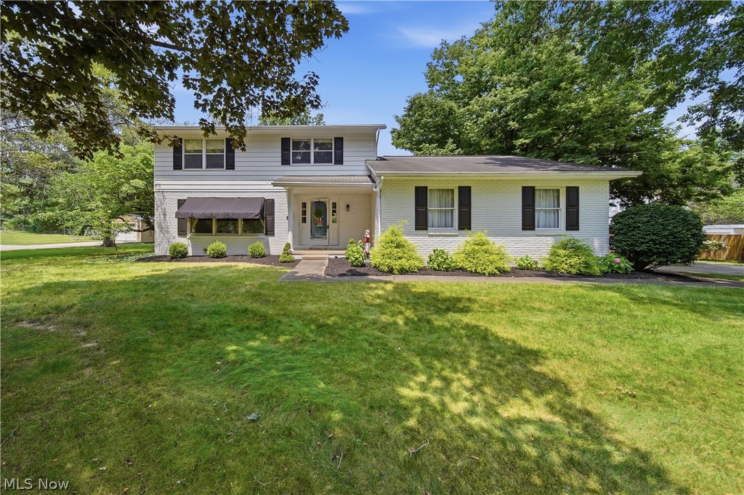 Welcome home to this spacious 3-bedroom, 2.5-bath home offering over 2,000 square feet of comfortable living space in one of Hartville's most desirable neighborhoods within the highly sought-after Lake Local School District!  The main level features a welcoming living room, a cozy family room, a formal dining room, an inviting kitchen, a convenient half bath, and a bright three-season sunroom overlooking the private backyard—perfect for morning coffee or relaxing evenings.  Upstairs, you'll find three generously sized bedrooms, including an impressive primary suite complete with two closets and a private en-suite full bath, creating the perfect retreat at the end of the day.  The finished lower level offers a spacious recreation room with durable Nature Stone flooring, plus abundant storage space to keep everything organized.  Step outside to enjoy the peaceful, private backyard featuring a patio just off the three-season room and a storage shed for all your lawn and garden equipment.  Ideally located within walking distance of many of Hartville's favorite destinations, including Ice Cream, local shops, restaurants, and community amenities, this home offers the perfect blend of convenience and neighborhood charm.  Lovingly maintained and exceptionally clean, this home is truly move-in ready while offering the perfect opportunity for the next owner to add their own personal style and cosmetic updates over time. A solid home with a fantastic floor plan, generous room sizes, and an unbeatable location—don't miss your chance to make this wonderful Hartville property your own!