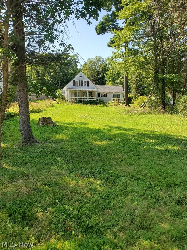 Welcome to this Cozy house in the highly desired Solon School District. When you walk in the front, you will be greeted with a large living room and step up dining room. This is a wonderful home with 3 Bedrooms, and 2 Full baths partially updated eat-in kitchen with stainless steel Appliances. Laundry is on first floor. Private wooded acre lot waiting for you to expand. Extra-large detached garage that can store a large boat or anything else. Raised deck along the side of the house overlooking the garden just waiting for your personal touch. Enclosed porch and a partially fenced in backyard. With the options of renovating, expanding or rebuilding, this home is waiting for its new owner with plenty of value-add options. Schedule your tour today. Seller is motivated