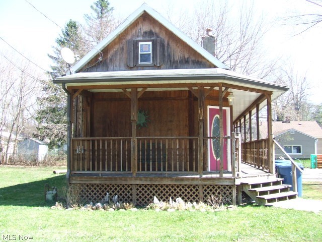 Cute little Bungalow/Ranch, great for downsizing or investment property.  First floor bedroom with "bonus room" and laundry, open floor plan of  kitchen/dining/living room area with breakfast bar island.  Upstairs is bedroom with cathedral ceiling and closet.  First floor bedroom does not have closet (washer and dryer in it) but bonus room could be made into closet.  Second parcel gives bigger yard plus city owned lot on other side.  Cement slab where there used to be a garage.  Stove and fridge stay with house.  Home warranty included.  Make your appointment today!  Current tenant would like to stay if buyer interested as investment.